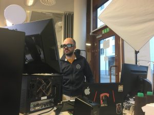 Jonas wearing 3D glasses and testing a monitor